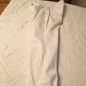 White jeans with rolled up hem